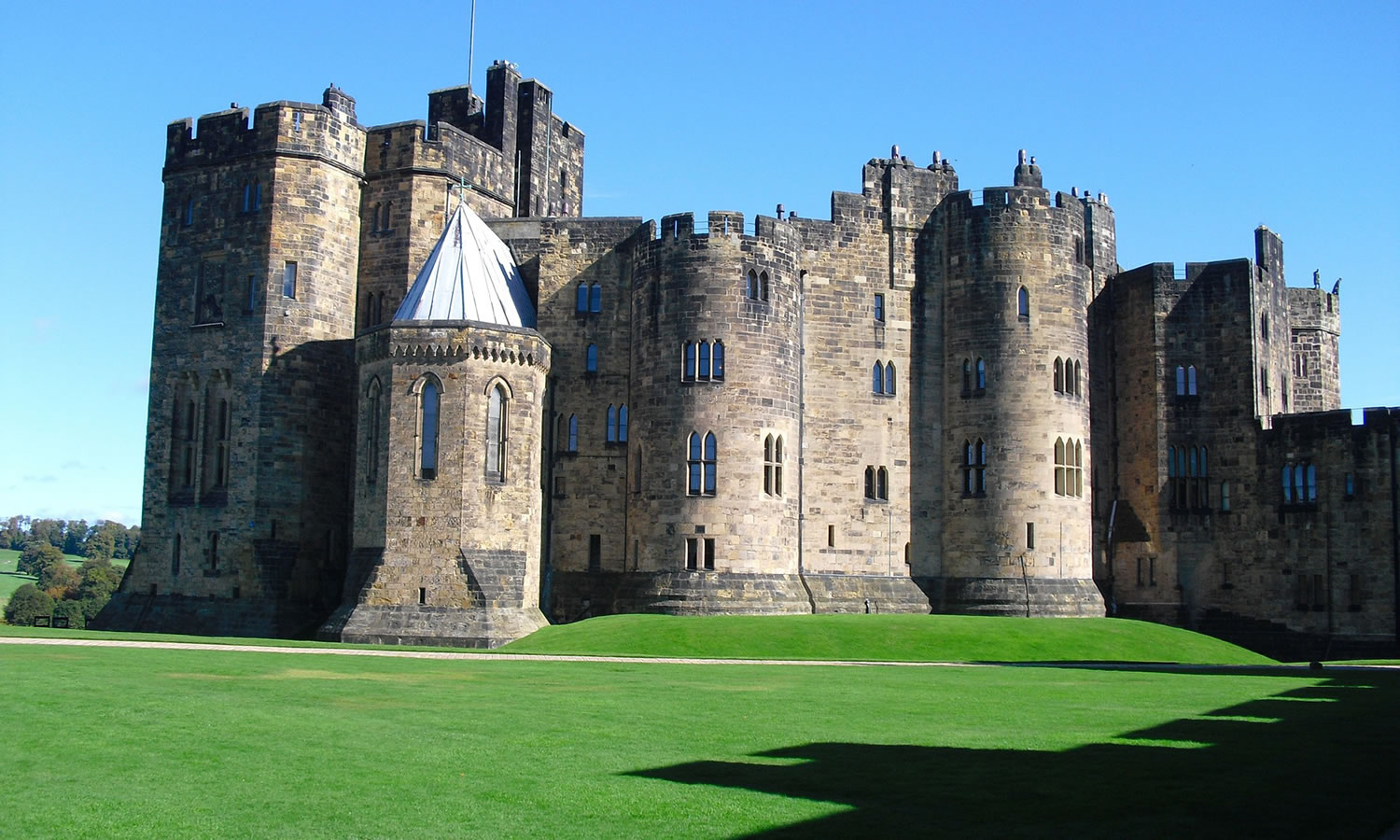 large castle on grass